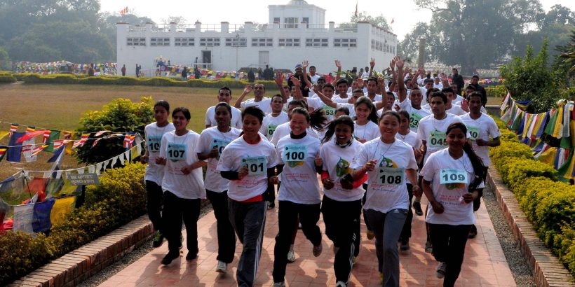 Participants of Lumbini Marathon runs in front of the  Maya devi temple at Lumbini on Tuesday, Janaury 15 2013. More than 250 runner participants in five categories . The Marathon was held  at the birth place of lord  Gautam Buddha to promote  Nepal as a destination of world peace . According to Bikram Pandey the organizer of Lumbini Marathon They aim to  promote Lumbini as the best  holyday destination thourgh tourism and its also promte for world peace . The Slogan of the marathon was "Run for peace, Run for Buddha, Run for Tourism and Run for Enlightment.